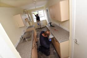 Falkirk Council workmen get an empty house ready for new tenants.  Pic: Contributed