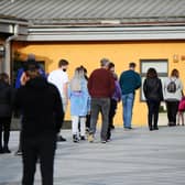 A large queue has formed as evening voters arrive in Kinnaird
