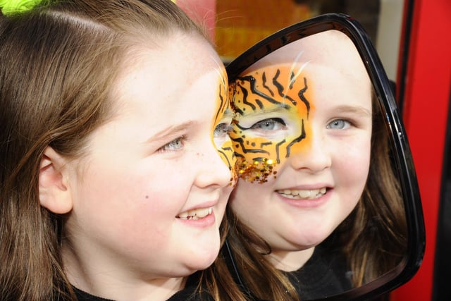 Rebecca Docherty (8) gets her face painted.