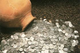 The biggest hoard of Roman coins ever found in Scotland were discovered when council workmen were digging foundations at the north end of Bells Meadow.