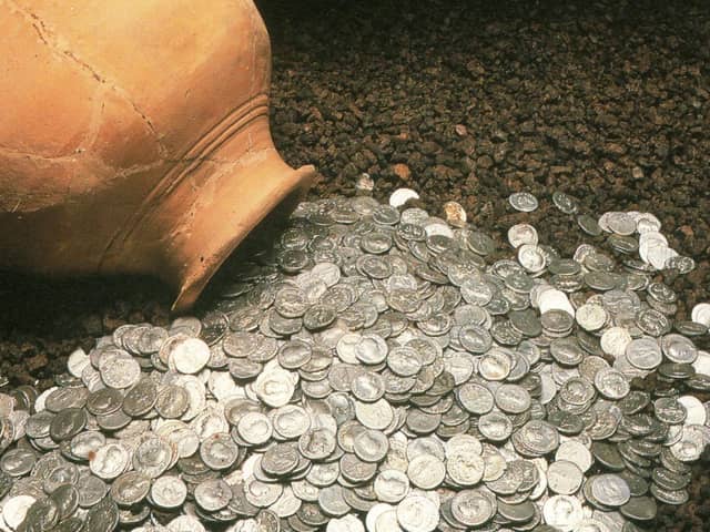 The biggest hoard of Roman coins ever found in Scotland were discovered when council workmen were digging foundations at the north end of Bells Meadow.
