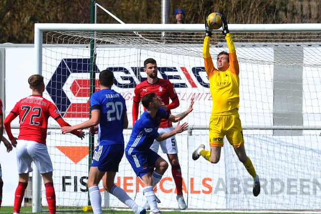 Falkirk keeper Robbie Mutch had to pick the ball out of the net twice at the Balmoral Stadium as Mitch Megginson scored a double from set plays