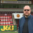 David Smith oversees Stenhousemuir FC's Blether Together telephone befriending service. Picture: Michael Gillen.