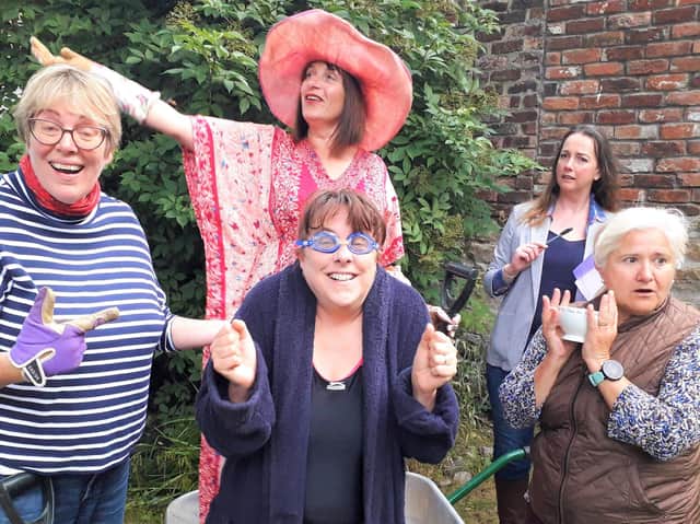 Linlithgow Players' cast members in rehearsal - front row from left to right, Sue Vizard, Liz Drewett and Serena Casburn Jones.  Back row Sue Spencer (in hat) and Thérèse Gallacher.
