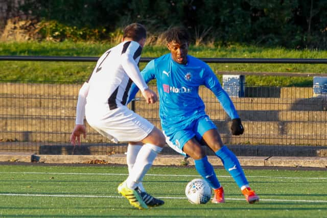 Goalscorer Tiwi Daramola on the ball