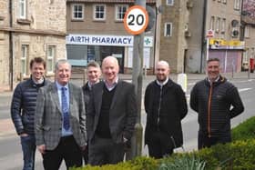 Depute Leader Paul Garner (centre), Cllr Jim Flynn (front right) joined by council officers from Place services as the 20mph pilot comes into force in Airth.  (Pic: Falkirk Council)