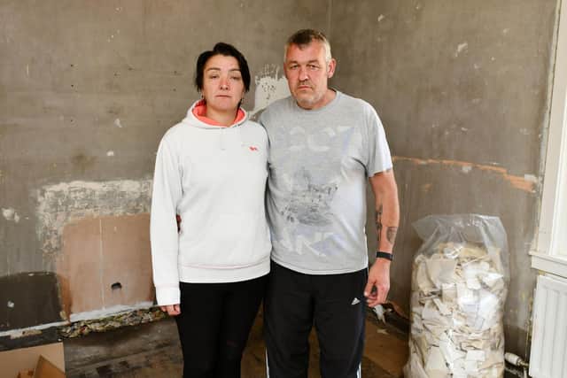 Joanne Ure, 45 and Brian Ure, 49 had to live in a caravan after floods devastated their home living in caravan  (Pic:Michael Gillen)