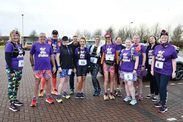 Some of those who came from all over the country to run the half marathon route despite the event being postponed at the last minute. These are all members of running group Team Bertie. Pic: Michael Gillen