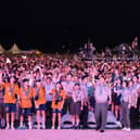 South Korea's President Yoon Suk Yeol and his wife Kim Keon Hee throwing paper airplanes during the opening ceremony of the 25th World Scout Jamboree in Saemangeum, about 180 km southwest of Seoul. Pic: AFP Photo/South Korean Presidential Office