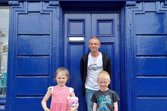 Rosie and Murray handed over their fundraising money to the Cancer Research UK shop on Linlithgow High Street.