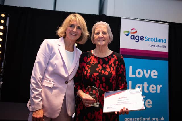 Margaret Berry receives her award from Kaye Adams