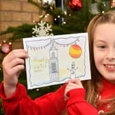 Laila Atfield with the Christmas card she designed for Michael Matheson MSP