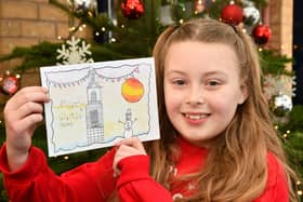 Laila Atfield with the Christmas card she designed for Michael Matheson MSP