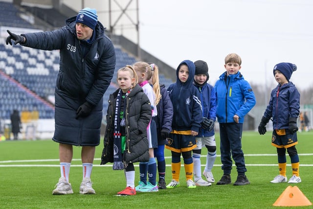 The event was a chance for the youngsters to meet the team and take part in player-led drills.  Brad McKay meets the youngsters.