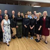 Falkirk councillors and members of Falkirk Champs board celebrate the council unanimously supporting a motion to make care experience a protected characteristic. Pic: LDR Service