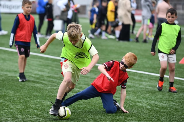 It may have been a fun day but that didn't stop the tackles flying in during the training drills!