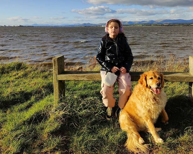 Grace Kidd with guide dog Mollie. Pic: Contributed
