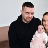 Baby Mia at home with mum Nicolle Maxwell and dad Scott Laidlaw. Pic: Michael Gillen