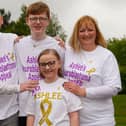 Braes High School pupil Ashlee Easton with dad Donald, mum Lisa and brother Jayden. Picture: Scott Louden.