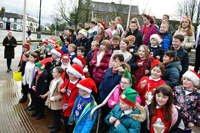 Pupils from Primary 4-6 pupils at Dunipace were at Denny Cross singing Christmas songs on Wednesday.