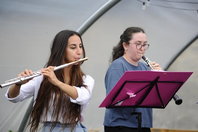 Nevis Ensemble playing in a poly tunnel.