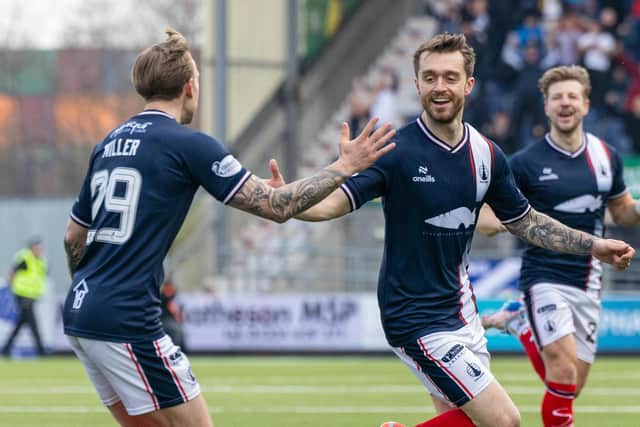 Brad Spencer wheels away to celebrate after scoring for Falkirk against Dunfermline Athletic (Photo: Mark Scates/SNS Group)