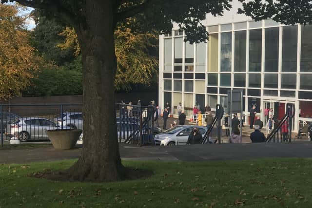 Queues build up outside Falkirk Town Hall as people wait to receive their flu jabs