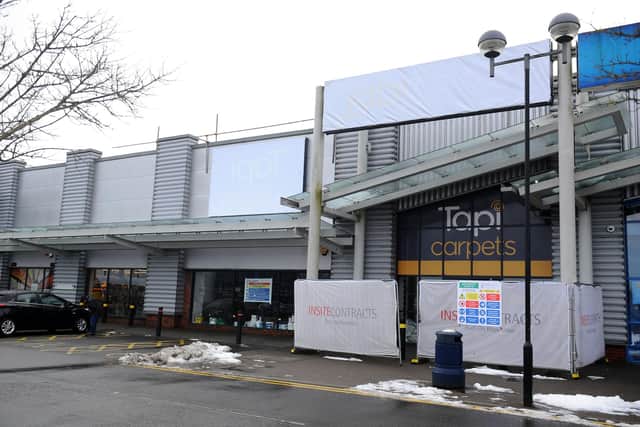 Work underway at the Former Tapi Carpets store where Insite Contracts barriers are erected (Photo: Michael Gillen).