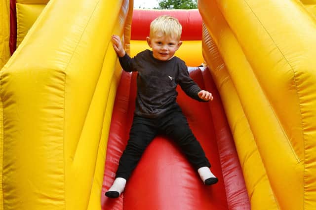 The inflatable slide was a big draw for youngsters at the fun day
(Picture: Michael Gillen, National World)