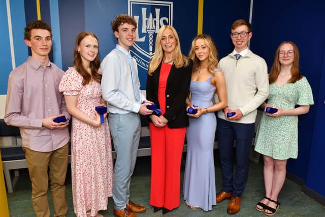 From left, Fergus Smith (Proxime Accessit); Jessica Lister (Proxime Accessit); Dane Brown (Dux); Rector Joanne Wilson; Eilidh Burke (Dux); Niall Fraser (Dux) and Sophie Isbister (Proxime Accessit).