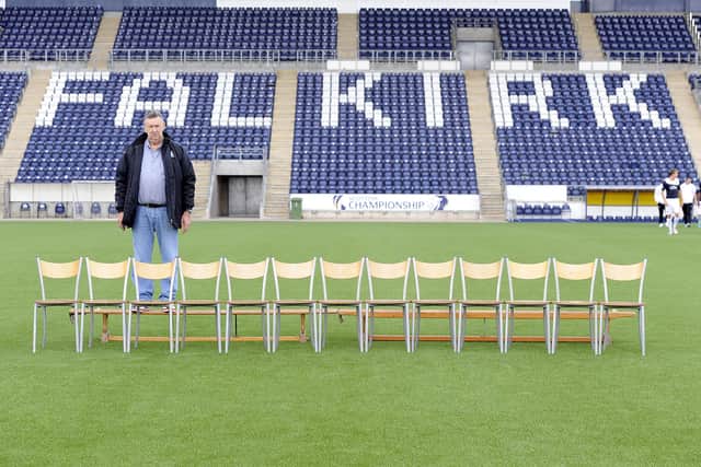 Gordon McFarlane in his media role helping organise the Falkirk team photo-shoot for the 2013/14 campaign (Photo: Michael Gillen)