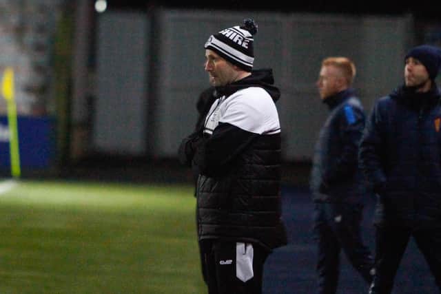 East Stirlingshire manager Derek Ure watches on from the touchline