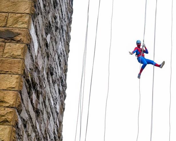We know Spiderman has a head for heights and he's proving it here!