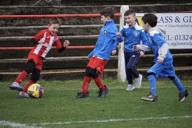 Little Kerse Galaxy FC youngsters play on Camelon Juniors' pitch at half time during Saturday's match (Photo: Kristopher Dowell)