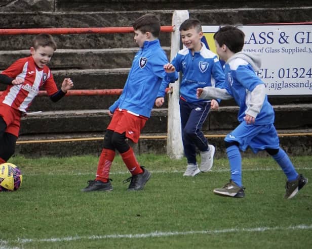 Little Kerse Galaxy FC youngsters play on Camelon Juniors' pitch at half time during Saturday's match (Photo: Kristopher Dowell)