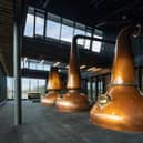 The copper stills can be seen by passers-by through the glass-fronted still room. Pic: Chris McCluskie