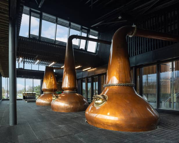 The copper stills can be seen by passers-by through the glass-fronted still room. Pic: Chris McCluskie