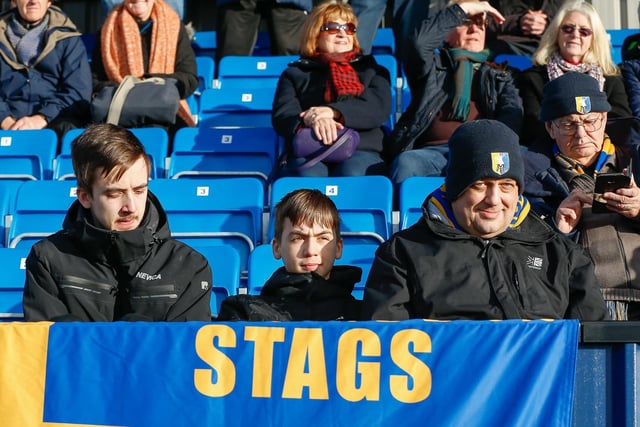 Mansfield Town fans at The Dunes Hotel Stadium for the match against Barrow.