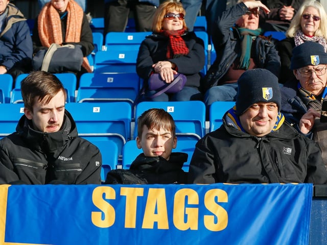Mansfield Town fans at The Dunes Hotel Stadium for the match against Barrow.