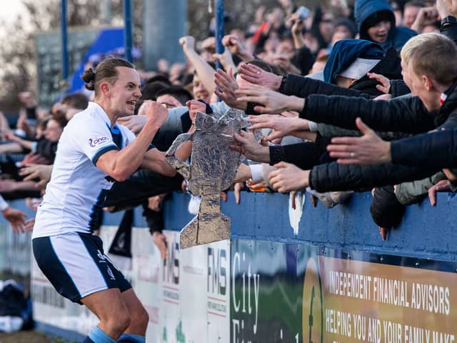 MONTROSE, SCOTLAND - MARCH 30: Falkirk's Aidan Nesbitt celebrates with fans after scoring to make it 2-0 during a cinch League One match between Montrose and Falkirk at Links Park Stadium, on March 30, 2024, in Montrose, Scotland.  (Photo by Sammy Turner / SNS Group)