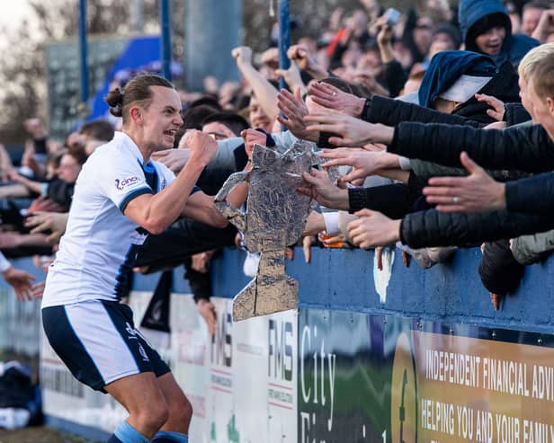 MONTROSE, SCOTLAND - MARCH 30: Falkirk's Aidan Nesbitt celebrates with fans after scoring to make it 2-0 during a cinch League One match between Montrose and Falkirk at Links Park Stadium, on March 30, 2024, in Montrose, Scotland.  (Photo by Sammy Turner / SNS Group)