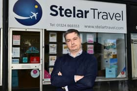 John Barr, owner of Stelar Travel in Stenhousemuir, is calling on the Scottish Government to provide greater support to the travel industry amid the coronavirus crisis. Picture: Michael Gillen.