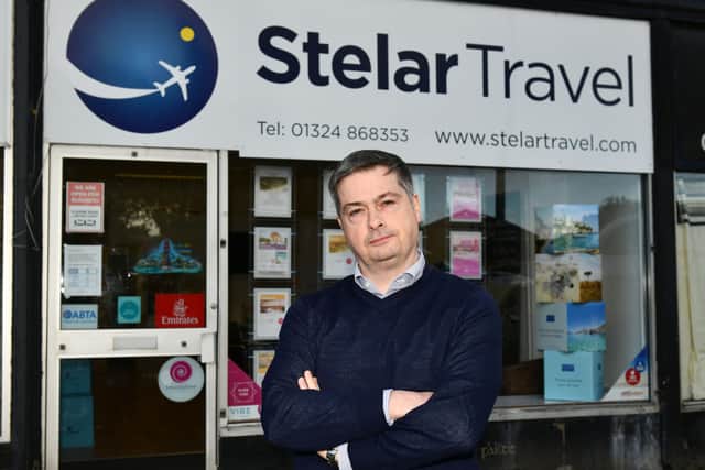 John Barr, owner of Stelar Travel in Stenhousemuir, is calling on the Scottish Government to provide greater support to the travel industry amid the coronavirus crisis. Picture: Michael Gillen.