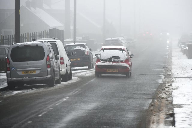 Snow and foggy conditions in Main Street, Shieldhill