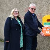 A new defibrillator has been installed outside Michael Matheson MSP's office at the east end of Falkirk High Street.  Pictured, from left, Elaine Grant (Falkirk Delivers business manager); Martin Stuart (trustee, Friends of Forth Valley First Responders) and Michael Matheson MSP.  (Pic: Michael Gillen)