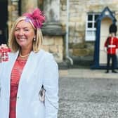 Jacquie Winning, chief executive of Forth Valley Sensory Centre, receives her MBE at the Palace of Holyrood