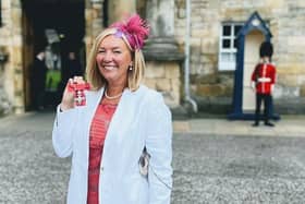 Jacquie Winning, chief executive of Forth Valley Sensory Centre, receives her MBE at the Palace of Holyrood