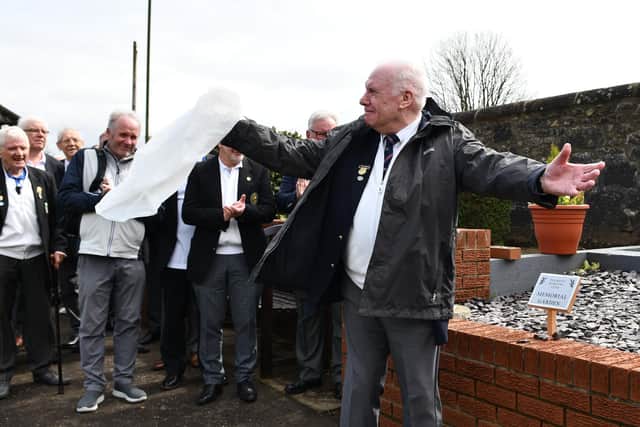 13-04-2024. Picture Michael Gillen. POLMONT. Polmont Bowling Club 150th Anniversary, memorial garden and green opening. Pictured: Alex Anderson, club member opening the Memorial Garden.
