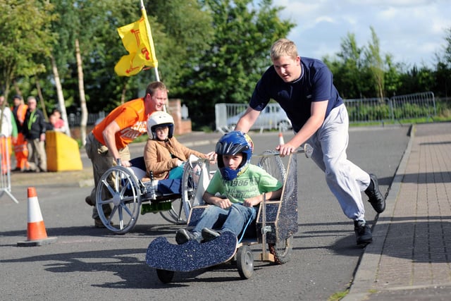 This pair are running close to the kerb.