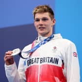 Silver medalist Duncan Scott of Team Great Britain celebrates during the medal ceremony for the Men's 200m Individual Medley Final on day seven of the Tokyo 2020 Olympic Games at Tokyo Aquatics Centre on July 30, 2021 in Tokyo, Japan. (Photo by Maddie Meyer/Getty Images)